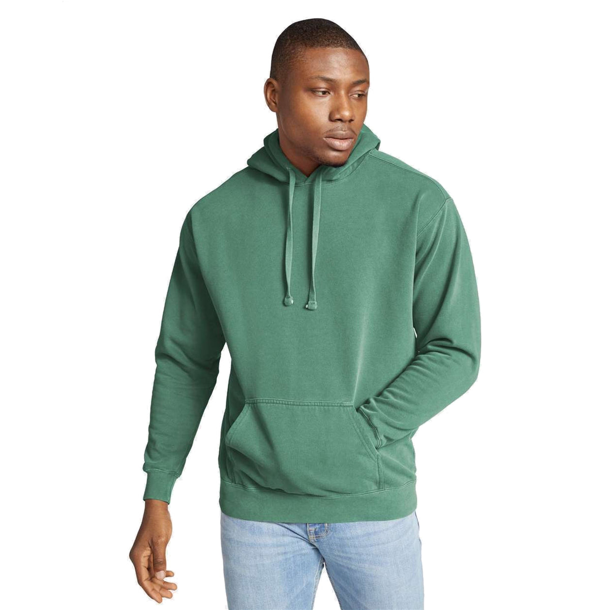Model wearing Comfort Colors 1567 Hooded Sweatshirt in Light Green - custom printing Tarpon Springs FL