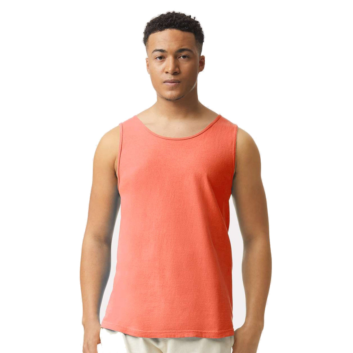 Model wearing Comfort Colors 9360 Heavyweight Tank Top in Bright Salmon - custom printing Tarpon Springs FL