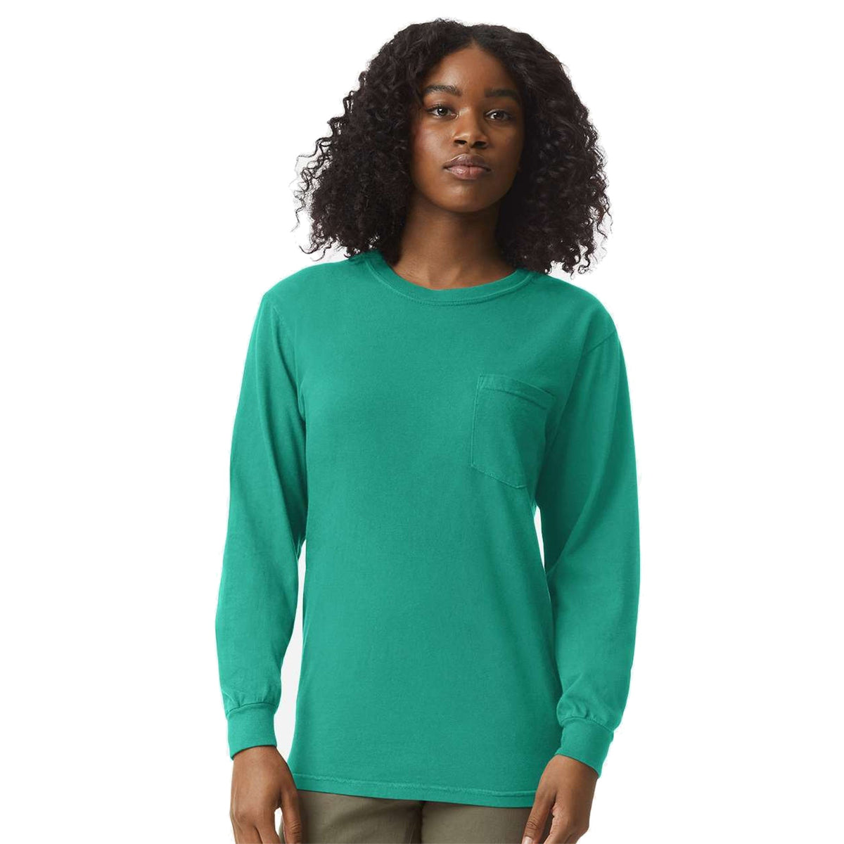 Model wearing Comfort Colors 4410 Heavyweight Long Sleeve Pocket T-Shirt in Island Green - custom printing Tarpon Springs FL
