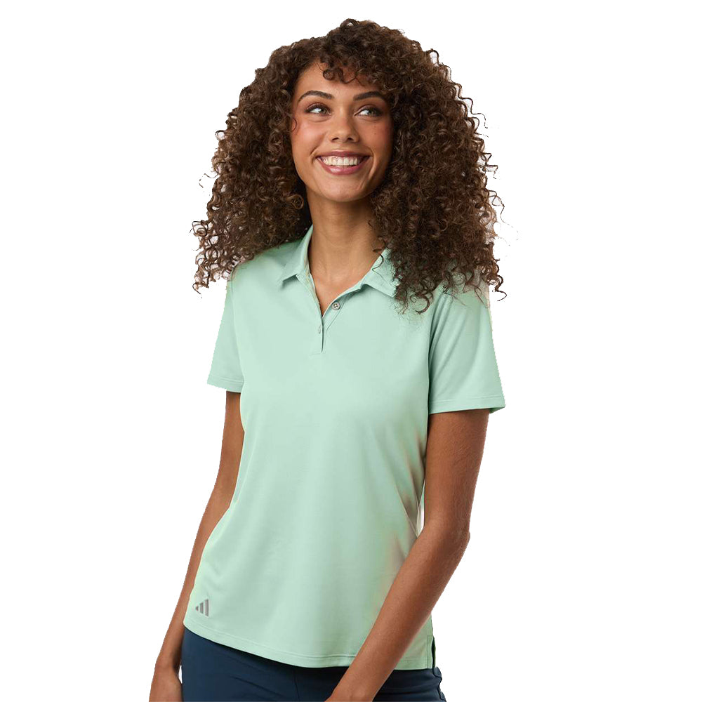 Model wearing a clear mint Adidas A231 women's polo