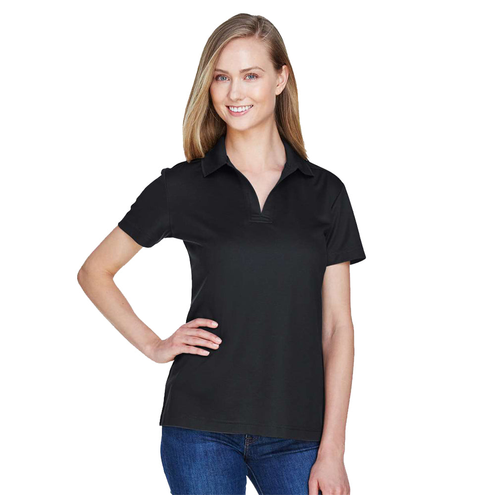 Model wearing a black Devon & Jones DG20W women's polo