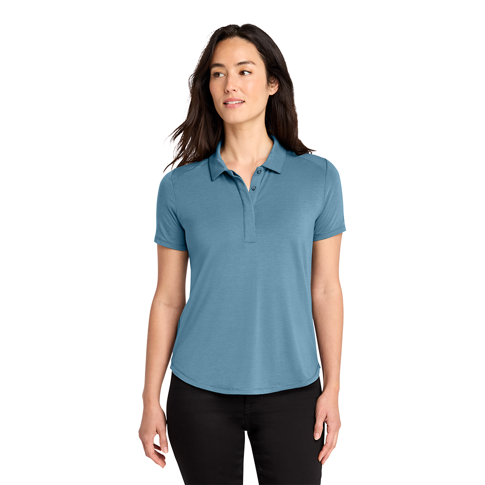 Model wearing a blue mist OGIO LOG152 women's Motion polo