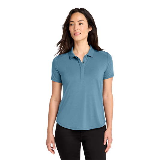 Model wearing a blue mist OGIO LOG152 women's Motion polo