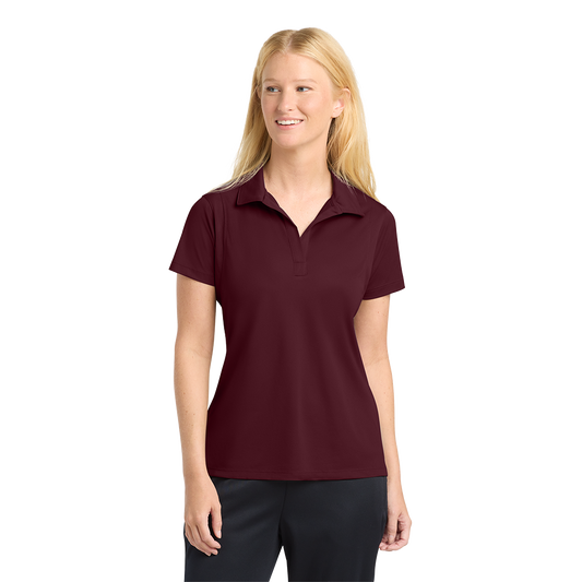 Model wearing a maroon Sport-Tek LST650 women's polo