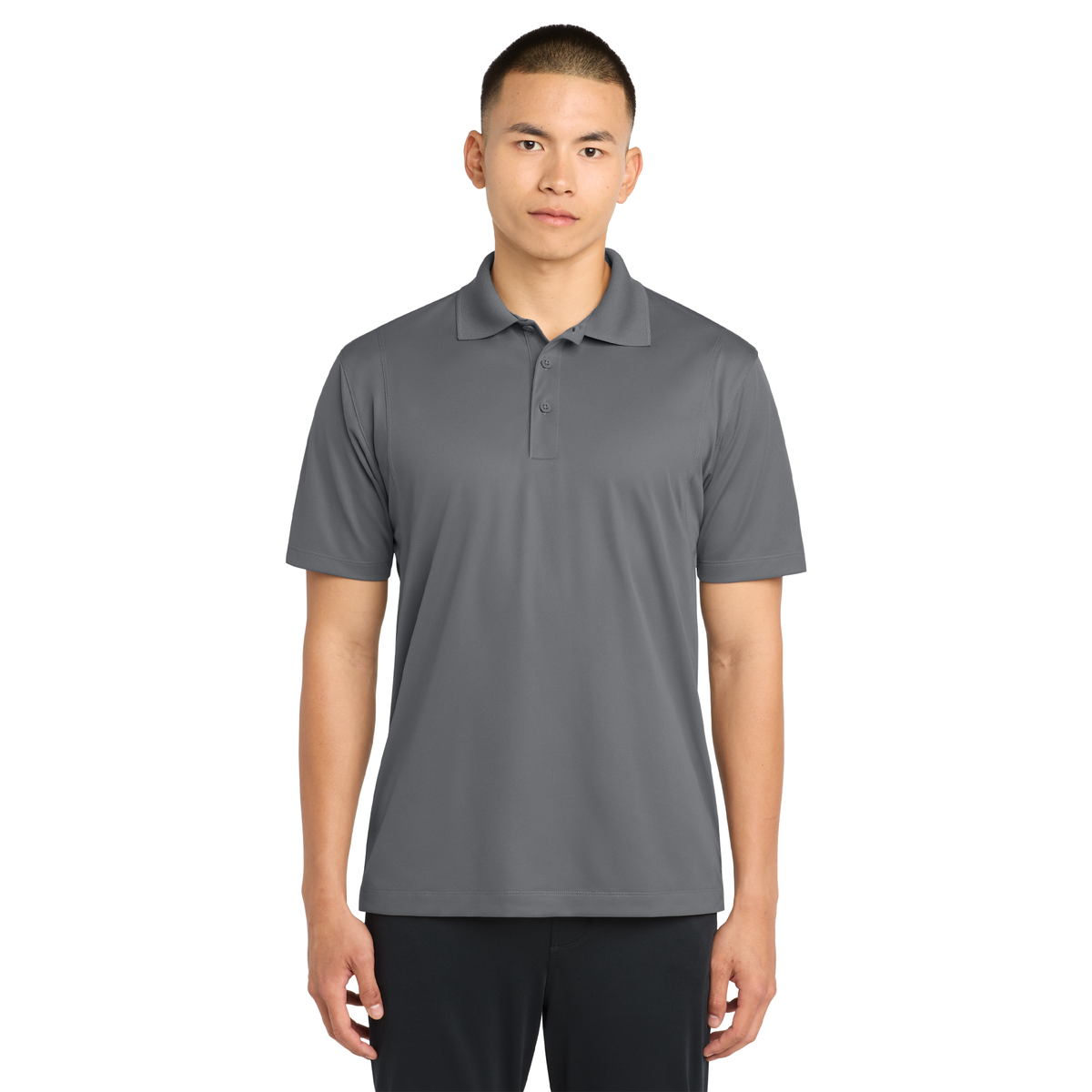 Model wearing a grey concrete Sport-Tek ST650 micropique polo