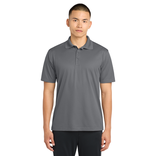 Model wearing a grey concrete Sport-Tek ST650 micropique polo