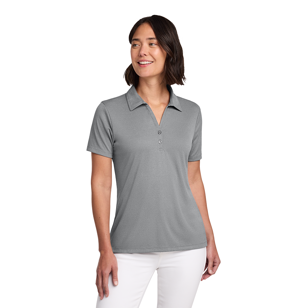 Model wearing a grey heather TravisMathew women's Coto polo